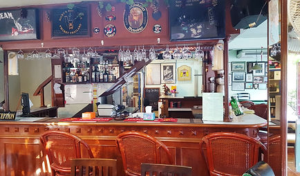 The bar at Joy's Cafe is all teak, small but nice.