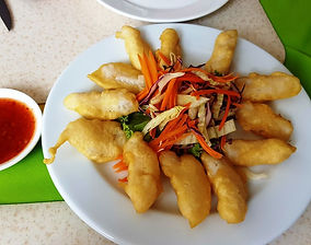 Deep fried fish pieces in batter